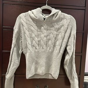 Hoodie sweater. In color gray, size xs.